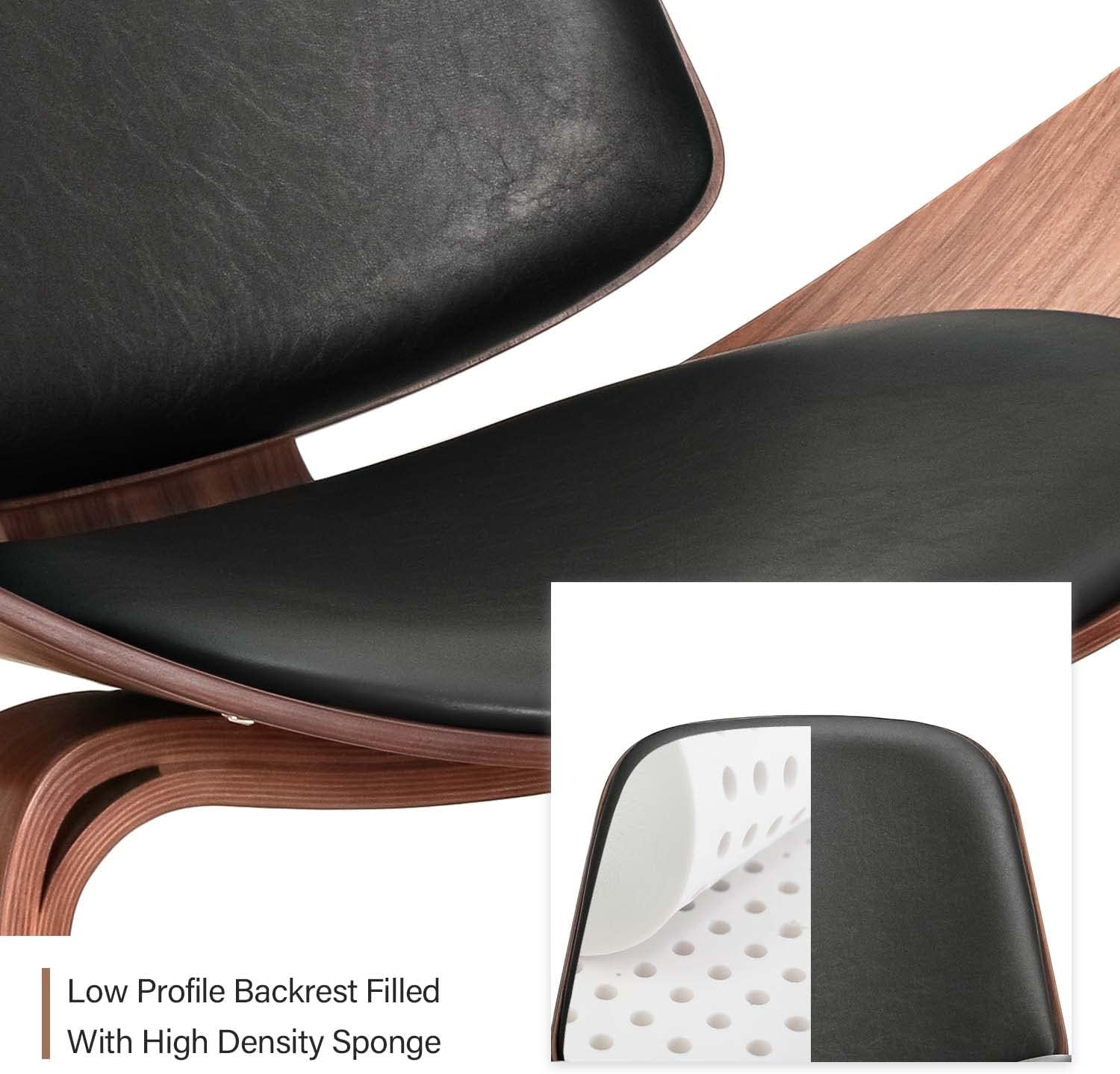 Close-up of Refurne’s CH07 Shell Lounge Chair – Walnut & Black Leather, highlighting its curved wood frame, black leather seat and backrest with high-density sponge filling, and the signature low-profile backrest in Hans Wenger style.