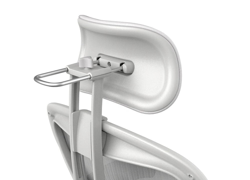 Close-up of the Refurne Herman Miller Aeron Headrest by Atlas – Cushion Edition (Mineral), showing its adjustable padded light gray cushion, metallic support frame, and a mesh backrest for enhanced ergonomic comfort.