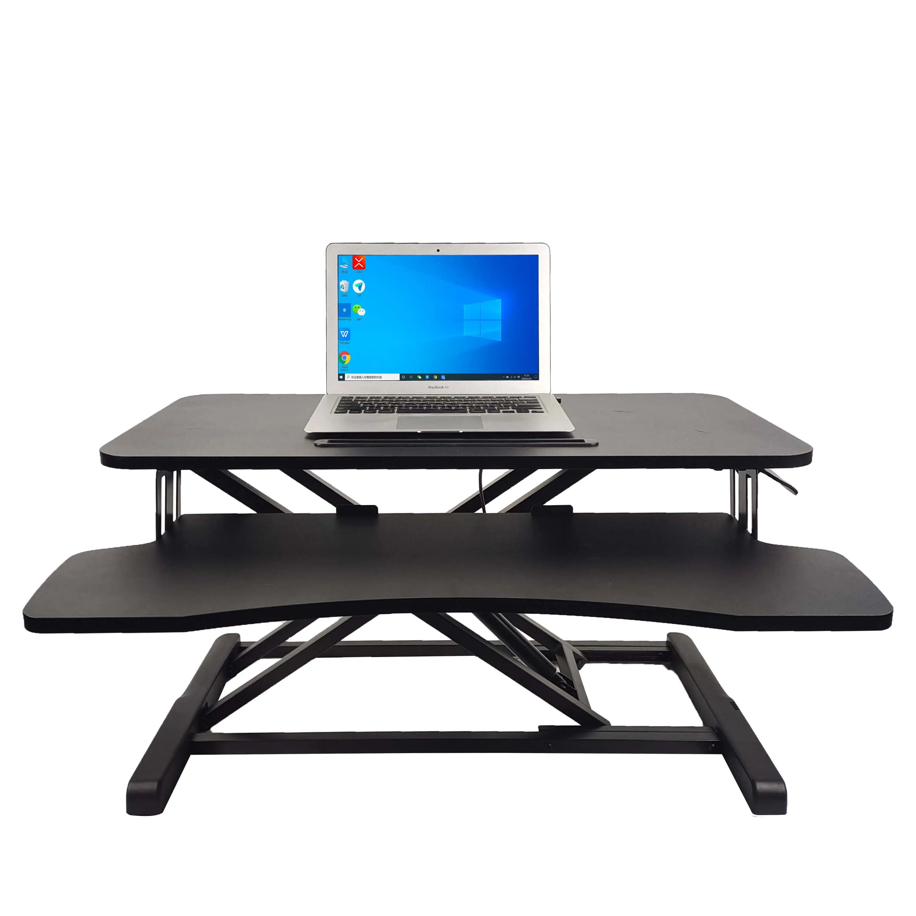 The Refurne Height Adjustable Standing Desk Riser Table in black features a foldable design, a lower keyboard tray, sturdy metal frame, and top tier with a laptop displaying Windows 10 for an ergonomic workstation.