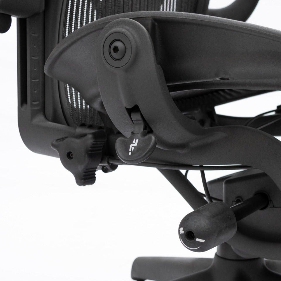 Close-up of Refurne Replacement Buttons for Herman Miller Classic Aeron Chair MK2, showing detailed seat height and tilt tension controls against a plain white background.