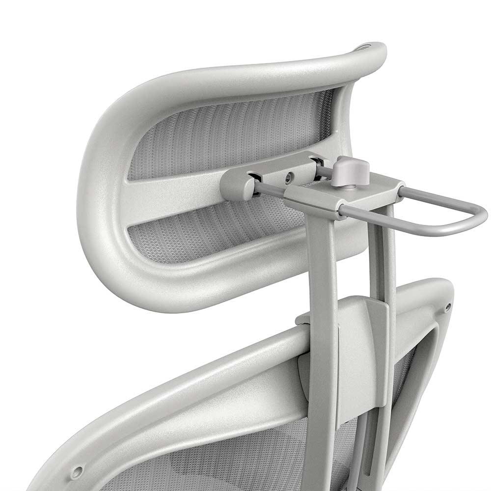 Close-up of the Refurne Atlas Headrest for Herman Miller Aeron Remastered Chair in Mineral, highlighting its light gray mesh backrest and headrest for enhanced breathability and comfort.
