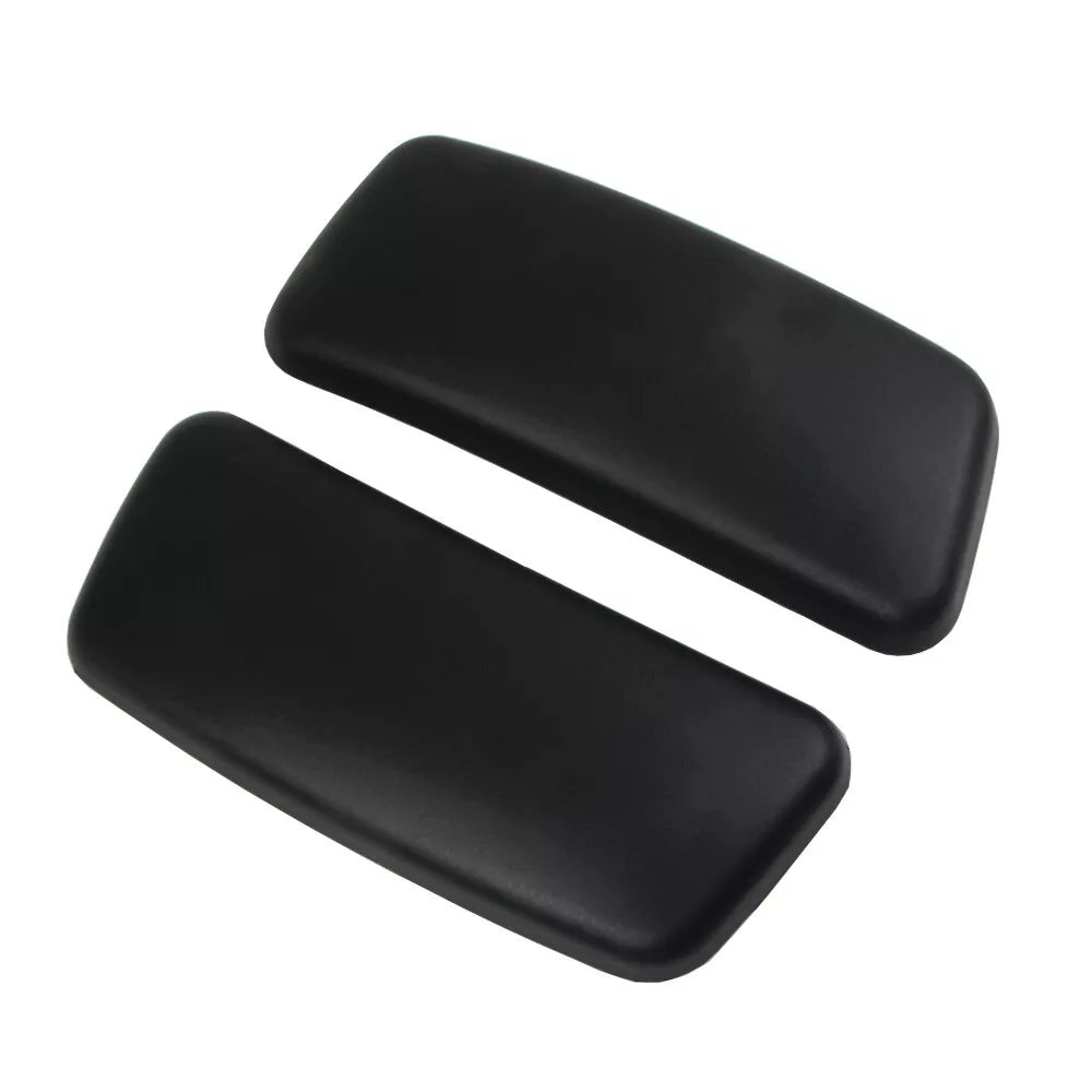 A pair of Refurne Haworth Zody Chair Replacement Arm Pads in black, with rounded edges, are side by side on a white background—ideal for upgrading your office chair armrests.